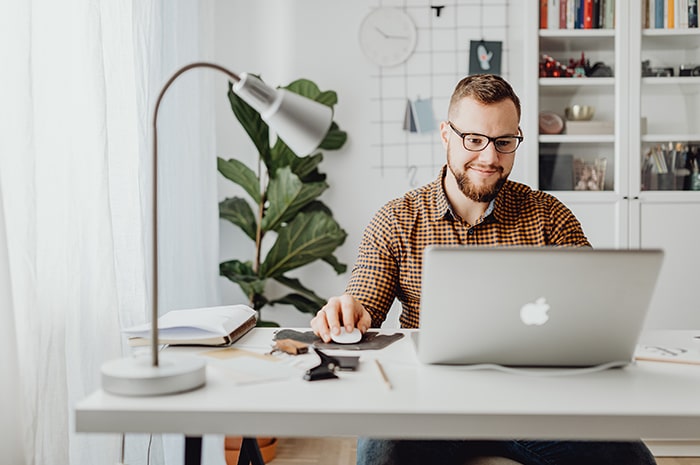 A person reading a book about affiliate marketing and online courses